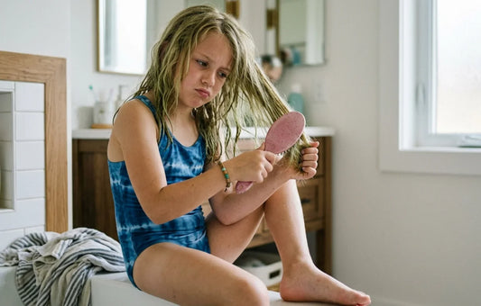 How to Repair Sun-Damaged Hair on Kids After a Summer of Swimming
