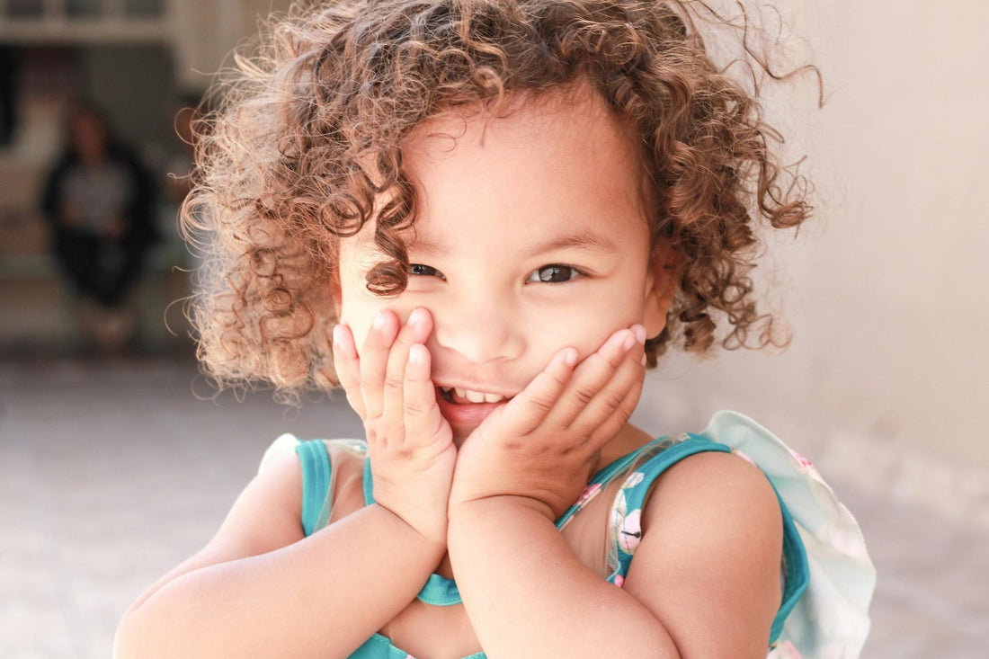 Frizz Fighters: Why Kids’ Curly Hair Gets Frizzy & How to Fix It