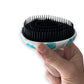 Close-up of kids mini detangling brush