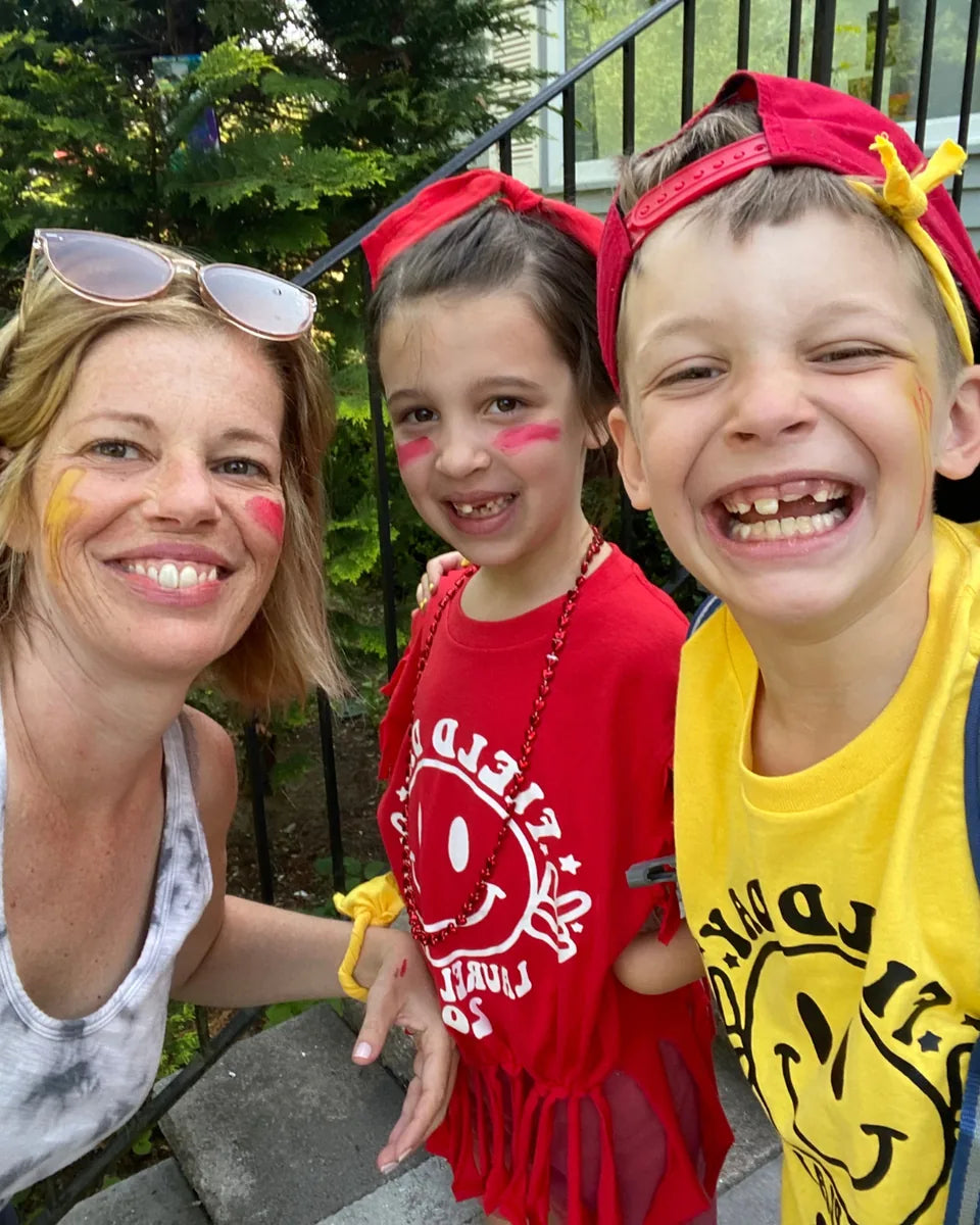 Becky Bavli with two of her kids, all smiling